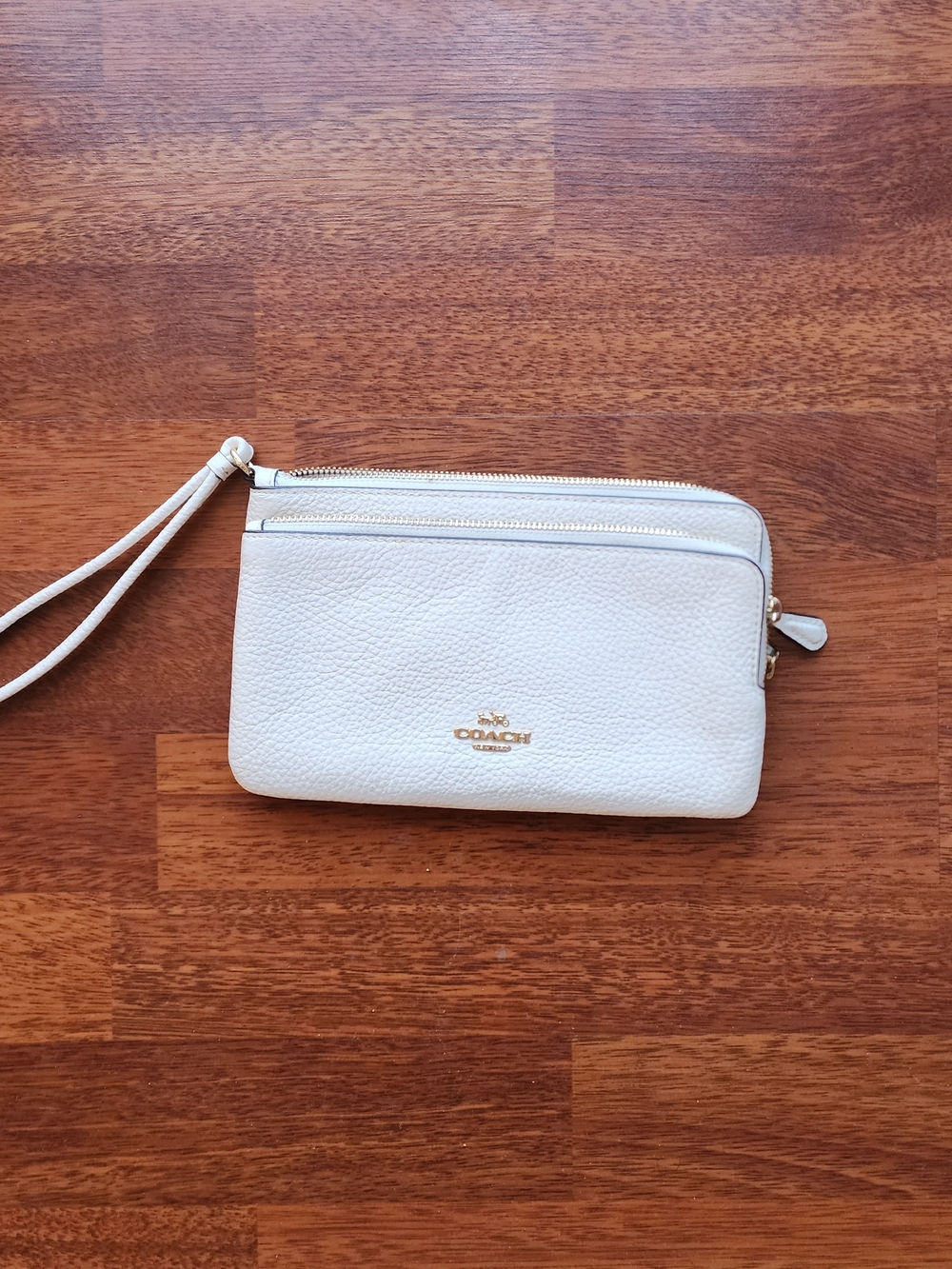 Coach Cream Pebbled Leather Wristlet with Gold Logo